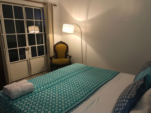 Imagen de la habitación del Hotel Magic Garden House. Foto 15