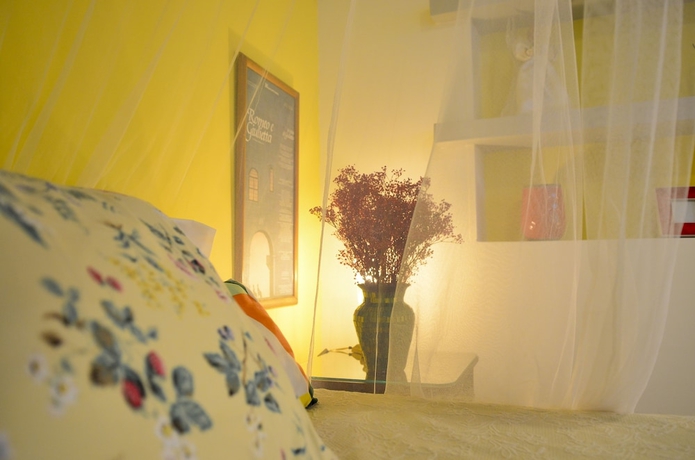 Imagen de la habitación del Hotel Magic Garden House. Foto 16