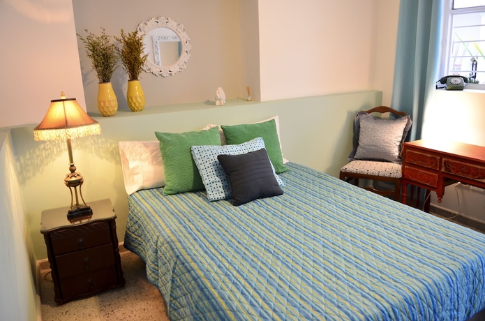Imagen de la habitación del Hotel Magic Garden House. Foto 18