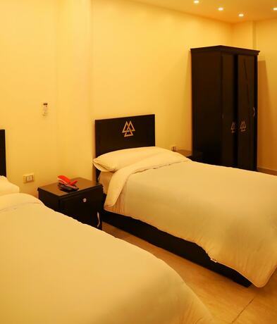 Imagen de la habitación del Hotel Magic Pyramids inn. Foto 13
