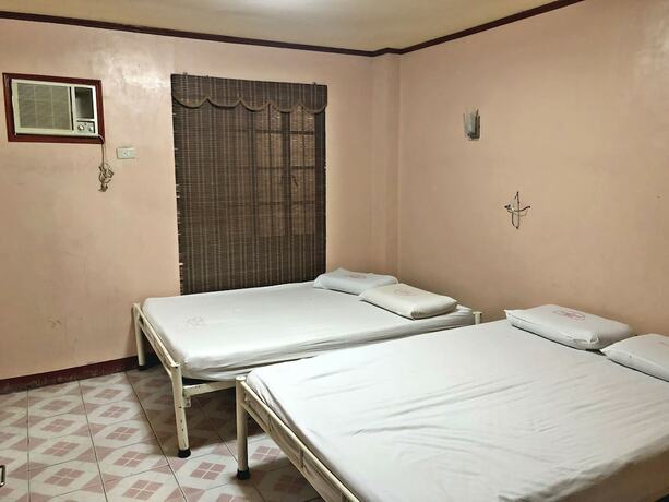 Imagen de la habitación del Hotel Magic Square Inn. Foto 17