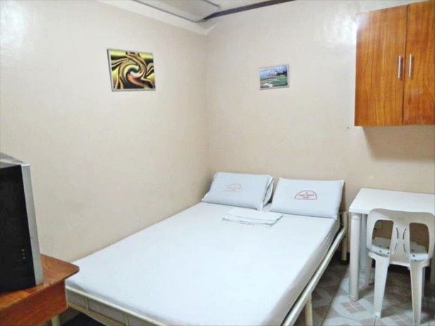 Imagen de la habitación del Hotel Magic Square Inn. Foto 18