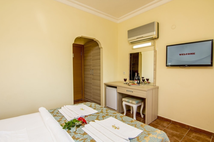 Imagen de la habitación del Hotel Magic Tulip. Foto 8