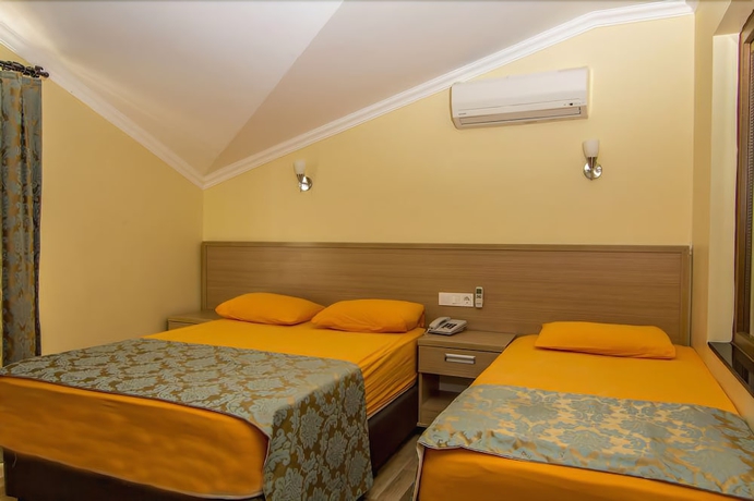 Imagen de la habitación del Hotel Magic Tulip. Foto 11