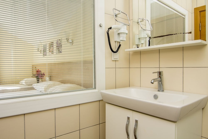 Imagen de la habitación del Hotel Magic Tulip. Foto 15