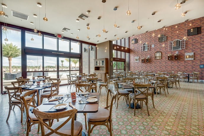 Imagen del bar/restaurante del Hotel Magic Village Yards, Trademark Collection by Wyndham. Foto 3