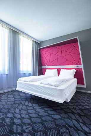 Imagen de la habitación del Hotel Magic Xhibition. Foto 7