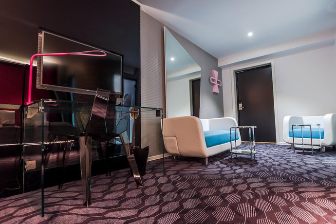 Imagen de la habitación del Hotel Magic Xhibition. Foto 17