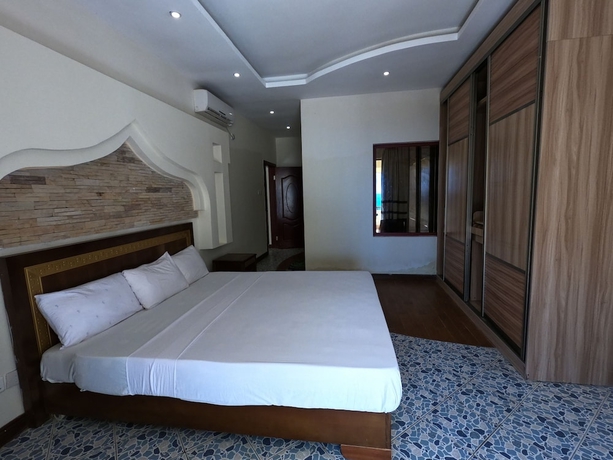 Imagen de la habitación del Hotel Magical Beachfront Apartments. Foto 3