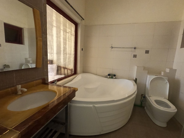 Imagen de la habitación del Hotel Magical Beachfront Apartments. Foto 10