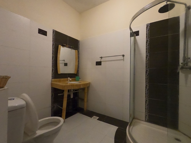 Imagen de la habitación del Hotel Magical Beachfront Apartments. Foto 11