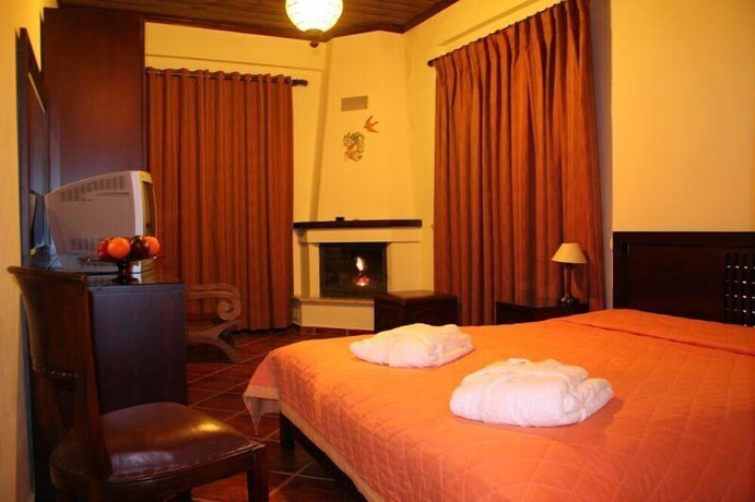 Imagen de la habitación del Hotel Magiossi. Foto 9