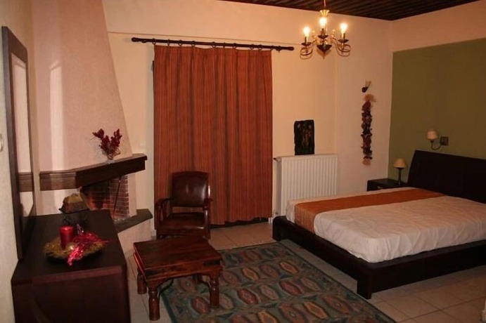 Imagen de la habitación del Hotel Magiossi. Foto 14