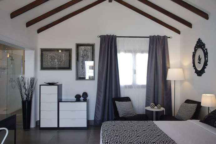 Imagen de la habitación del Hotel Magma Rooms. Foto 16