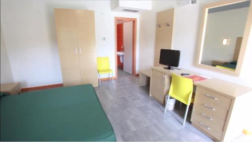 Imagen de la habitación del Hotel Magna Grecia Village. Foto 8