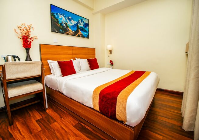 Imagen de la habitación del Hotel Magnificent, Katmandu. Foto 13