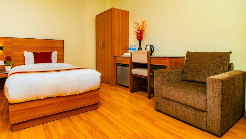 Imagen de la habitación del Hotel Magnificent, Katmandu. Foto 14