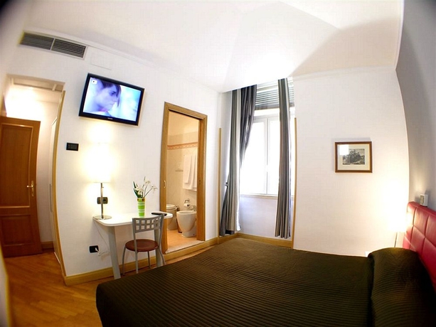 Imagen de la habitación del Hotel Magnifico Rome. Foto 10