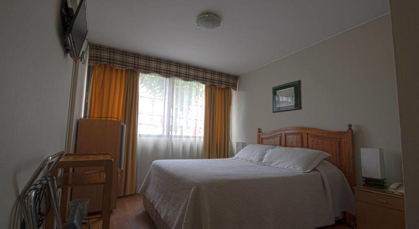 Imagen de la habitación del Hotel Magno. Foto 7