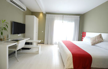 Imagen de la habitación del Hotel Magno Suites. Foto 5