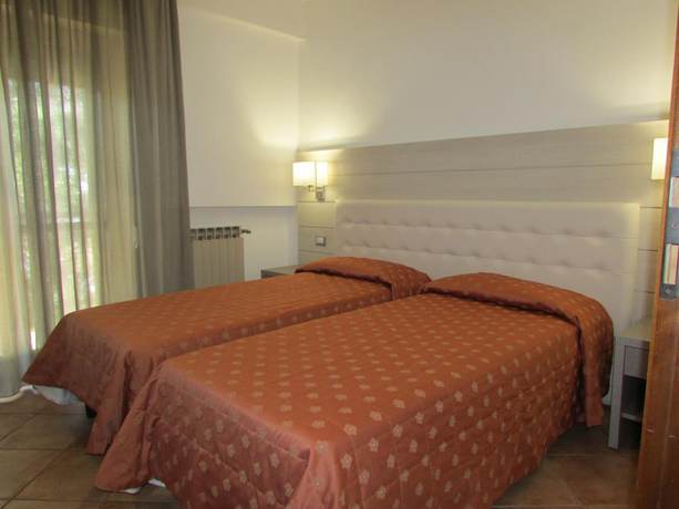 Imagen de la habitación del Hotel Magnola Palace. Foto 14