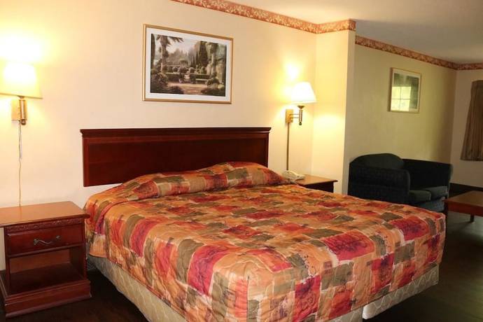 Imagen de la habitación del Hotel Magnolia Bay and Suites. Foto 10