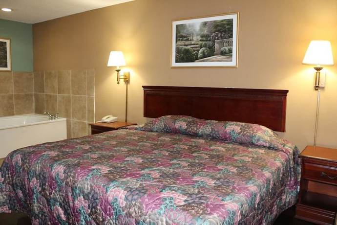 Imagen de la habitación del Hotel Magnolia Bay and Suites. Foto 12
