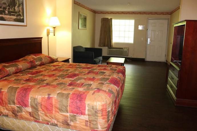 Imagen de la habitación del Hotel Magnolia Bay and Suites. Foto 13