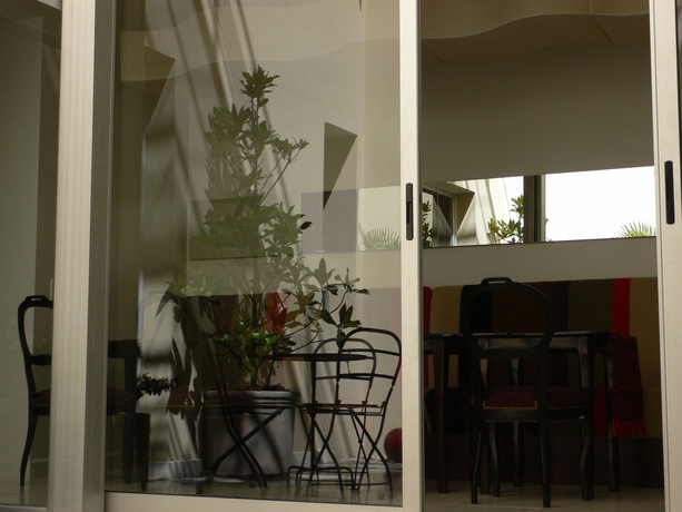 Imagen del bar/restaurante del Hotel Magnolia Boutique. Foto 2