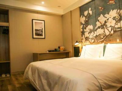 Imagen general del Hotel Magnolia Business Yangzhou Wanda Plaza Shunda Road. Foto 1