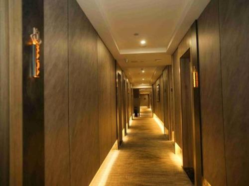 Imagen general del Hotel Magnolia Business Yangzhou Wanda Plaza Shunda Road. Foto 12
