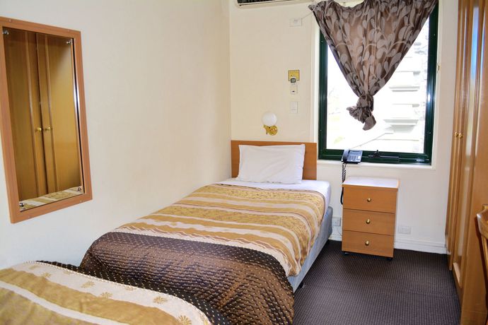 Imagen de la habitación del Hotel Magnolia Court Boutique Melbourne. Foto 6