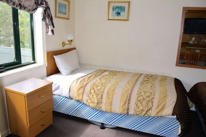 Imagen de la habitación del Hotel Magnolia Court Boutique Melbourne. Foto 9