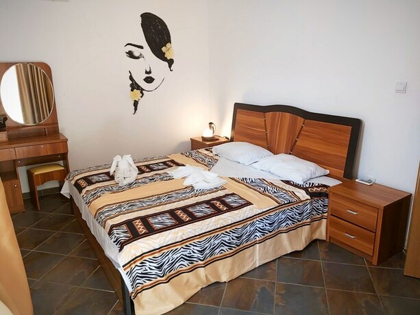 Imagen de la habitación del Hotel Magnolia Garden Family. Foto 21