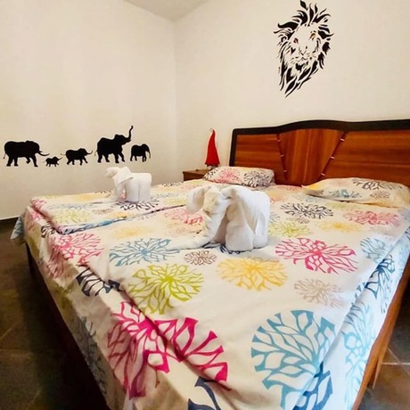 Imagen de la habitación del Hotel Magnolia Garden Family. Foto 22