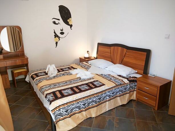 Imagen de la habitación del Hotel Magnolia Garden Family. Foto 26