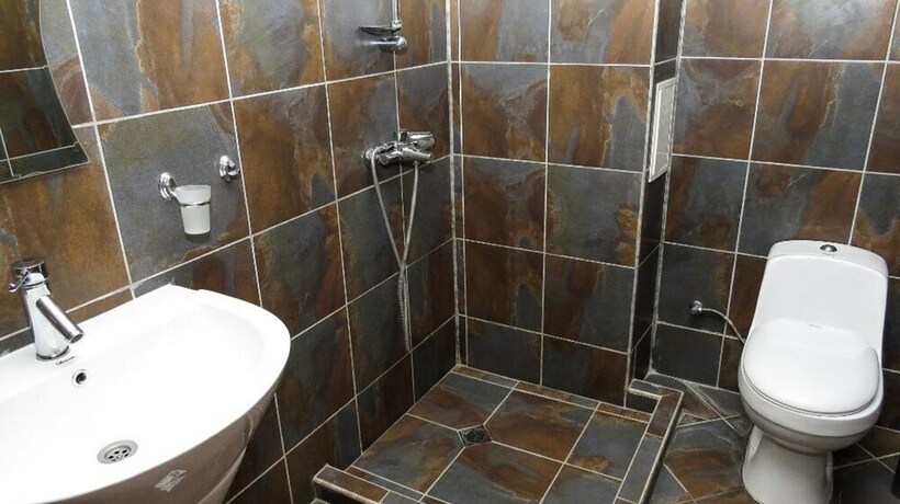 Imagen de la habitación del Hotel Magnolia Garden Family. Foto 30
