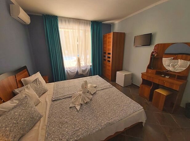 Imagen de la habitación del Hotel Magnolia Garden Family. Foto 31