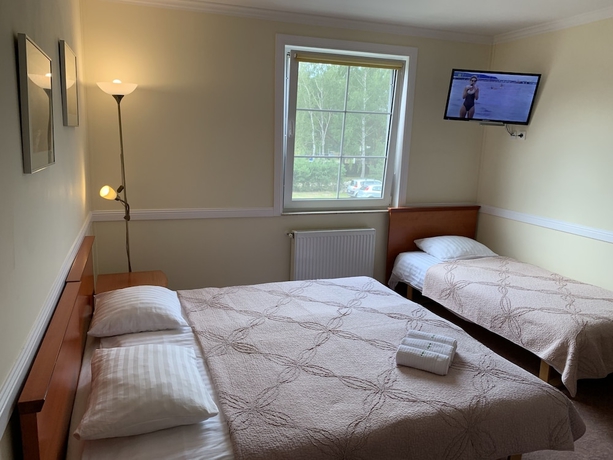 Imagen de la habitación del Hotel Magnolia Guest House. Foto 7