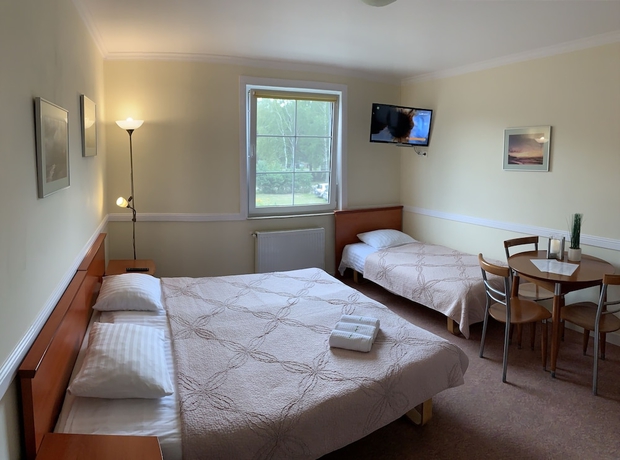 Imagen de la habitación del Hotel Magnolia Guest House. Foto 11