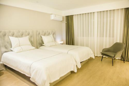 Imagen de la habitación del Hotel Magnolia Guilin Yangshuo West Street. Foto 7