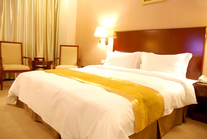 Imagen de la habitación del Hotel Magnolia Hotel - Shenzhen. Foto 2