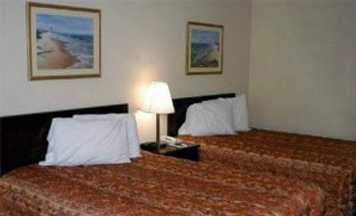 Imagen de la habitación del Hotel Magnolia Inn Kingsland. Foto 5