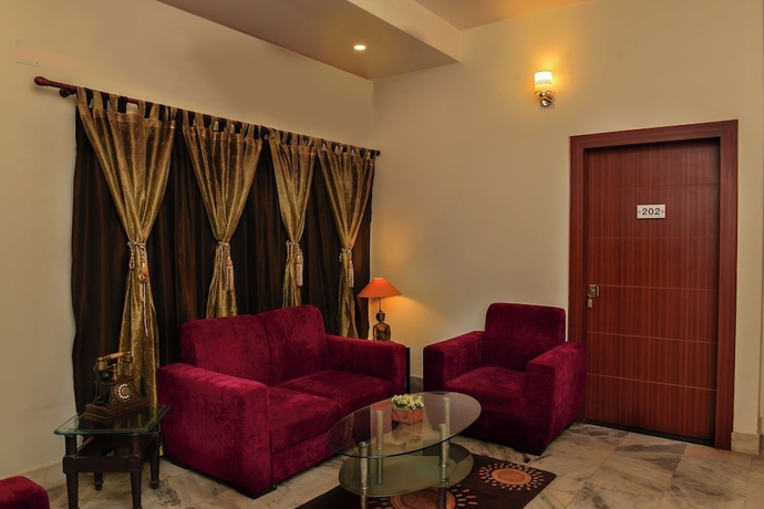 Imagen de los interiores del Hotel Magnolia Inn near GNRC and Secretariat, GS Rd. Foto 15