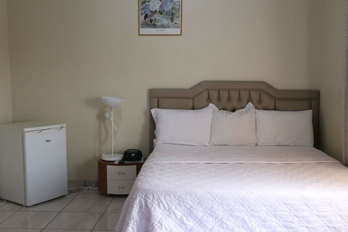 Imagen de la habitación del Hotel Magnolia Lodge. Foto 12