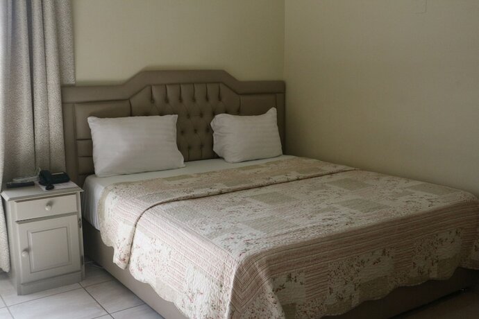 Imagen de la habitación del Hotel Magnolia Lodge. Foto 15