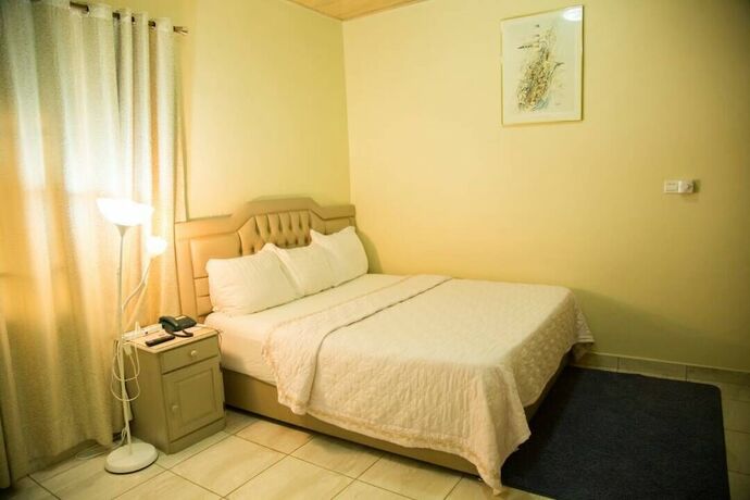 Imagen de la habitación del Hotel Magnolia Lodge. Foto 16