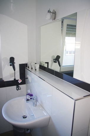 Imagen de la habitación del Hotel Magnolia, Oberursel. Foto 2