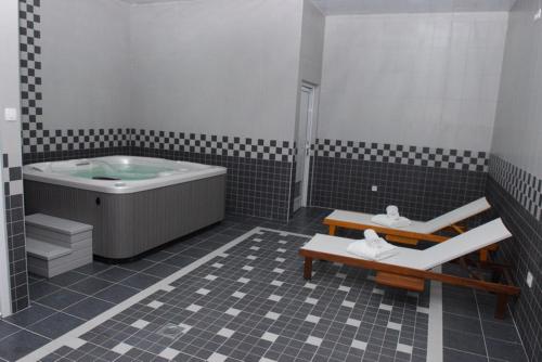 Imagen de la habitación del Hotel Magnolia Place. Foto 14