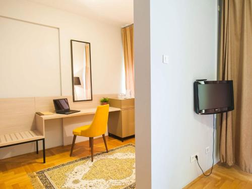 Imagen de la habitación del Hotel Magnolia Place. Foto 16